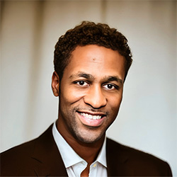 Portrait photo of a smiling man in business attire with testimonial text about MMWB improving data purpose and efficiency. Testimonial from Emory W. of Whittington Group Realty stating MMWB gave their data purpose, helping them close deals faster and save time.