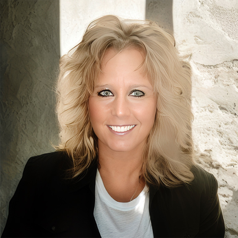 Portrait photo of a smiling blonde woman with testimonial text. Testimonial from Tammy W. of Universal Marketing Group praising Ben Klaiber’s insights that boosted sales and profits across top-tier products.